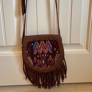 Genuine leather crossbody purse. Hand Embroidered with fun pattern and colors